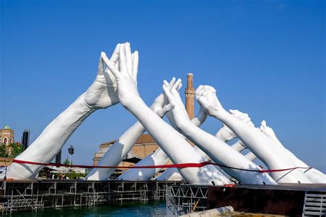 The Unseen Hand: A Monumental Sculpture Exploring Themes of Power and Vulnerability